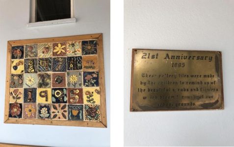 Artwork from Danai’s elementary school and a plaque