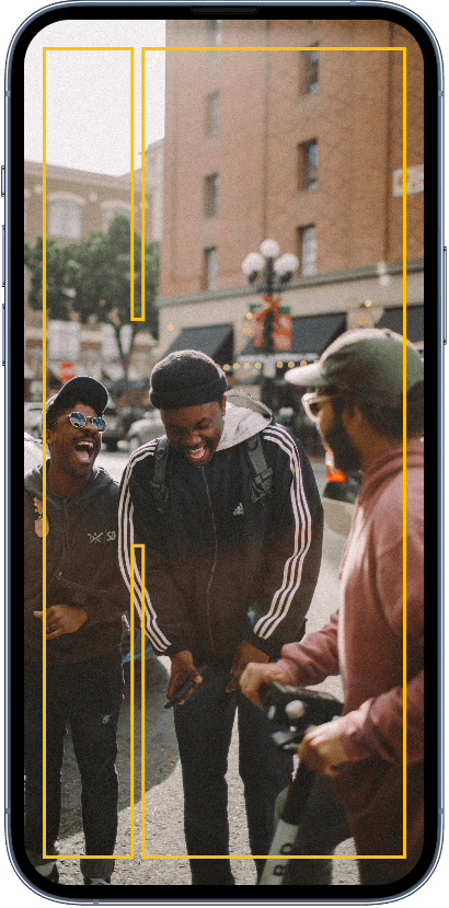 Youth conversing on the street and laughing